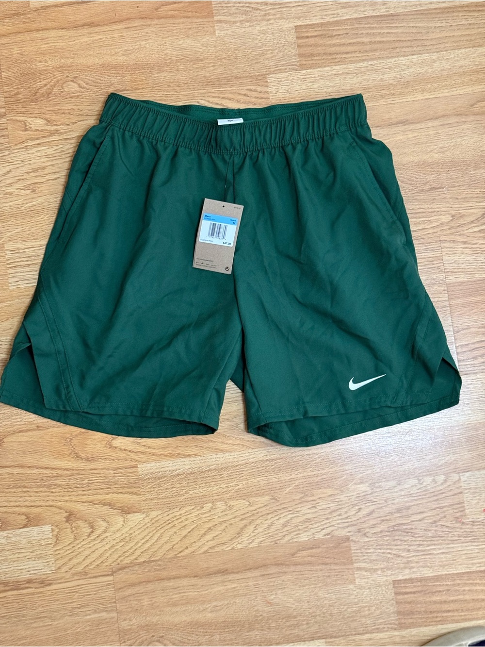 Nike Men's Dark Green Athletic Running Shorts with White Swoosh